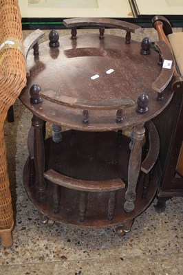 Lot 306 - A circular two tier drinks trolley