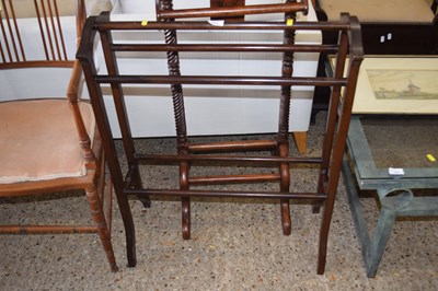 Lot 319 - Dark wood towel horse