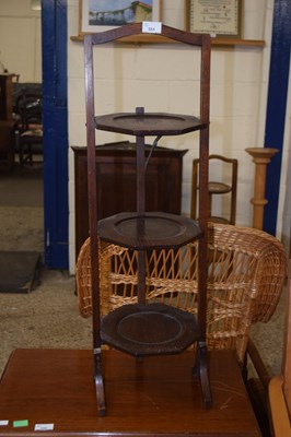 Lot 351 - An early 20th Century oak folding cake stand