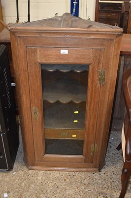 Lot 357 - Georgian oak wall mounted corner cabinet