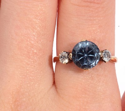 Lot 30 - 18ct gold blue topaz and diamond ring, the...