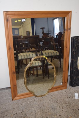 Lot 385 - A large rectangular pine framed wall mirror...