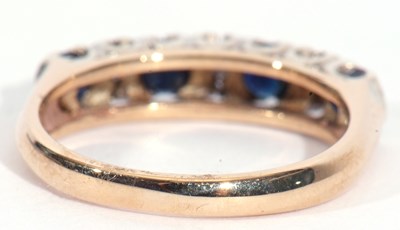 Lot 38 - 9ct gold sapphire and diamond half hoop ring,...