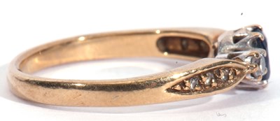 Lot 40 - 9ct gold sapphire and diamond three stone ring,...