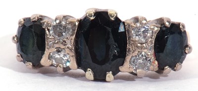 Lot 44 - 18ct gold sapphire and diamond ring featuring...