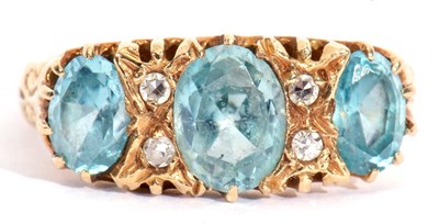 Lot 48 - Aquamarine and diamond ring featuring three...