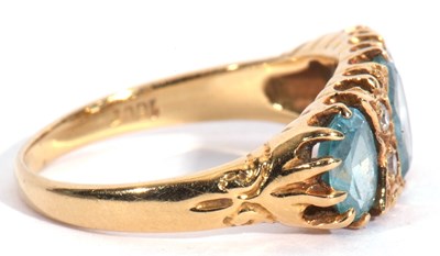 Lot 48 - Aquamarine and diamond ring featuring three...