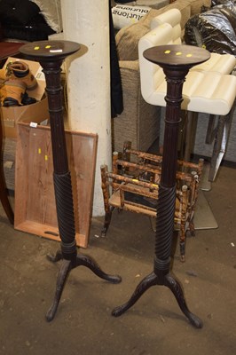 Lot 722 - A pair of torchieres