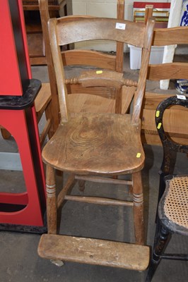 Lot 737 - A pine chair with foot rest