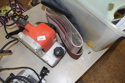 Lot 1054 - Makita belt sander together with sanding belts