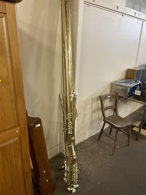 Lot 665 - Quantity of brass finish curtain poles