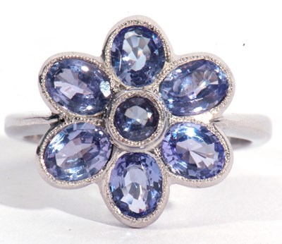 Lot 78 - 18ct white gold and tanzanite cluster ring, a...