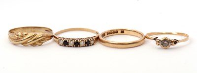 Lot 44 - Three 9ct rings and a gemset ring: to include...