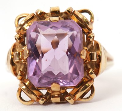 Lot 20 - An amethyst ring, the mixed cut amethyst in a...