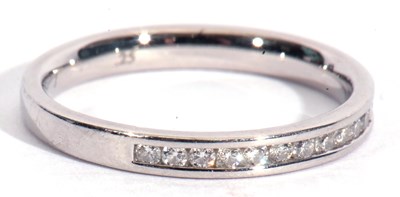 Lot 93 - Platinum and diamond half eternity ring,...