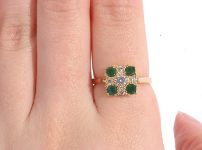 Lot 97 - 18ct gold diamond and emerald cluster ring,...
