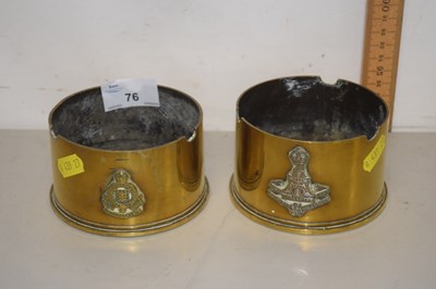 Lot 76 - A pair of trench art brass ashtrays formed...