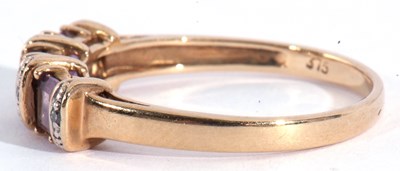Lot 118 - Modern 9ct gold amethyst and diamond ring...