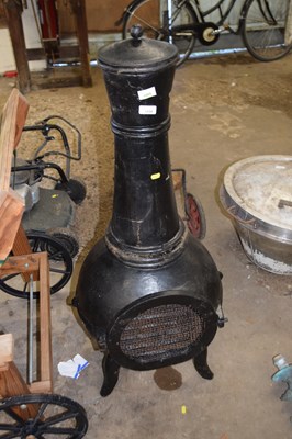 Lot 1058 - An iron chiminea