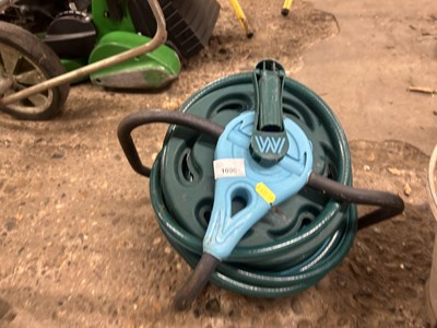 Lot 1096 - Garden hose on reel