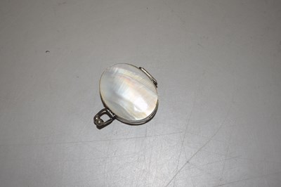 Lot 92 - A mother of pearl and white metal mounted pill...