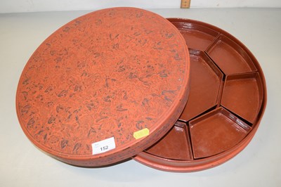 Lot 152 - A 20th Century Burmese red lacquered circular...