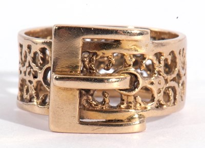 Lot 131 - 9ct gold pierced buckle ring, the wide band...