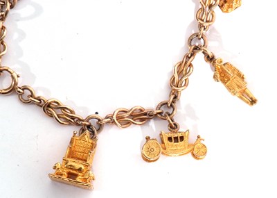 Lot 137 - 9ct gold fancy link bracelet suspending seven...