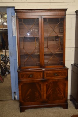 Lot 217 - Reproduction mahogany bookcase cabinet with...