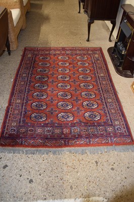 Lot 248 - 20th Century Tekke style floor rug with large...