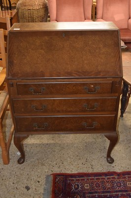 Lot 250 - 20th Century walnut veneered three drawer...