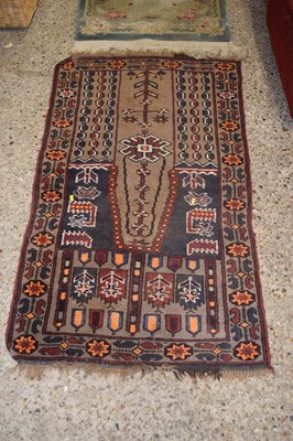 Lot 264 - A Middle Eastern wool floor rug decorated with...