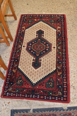 Lot 267 - A 20th Century Middle Eastern wool floor rug...