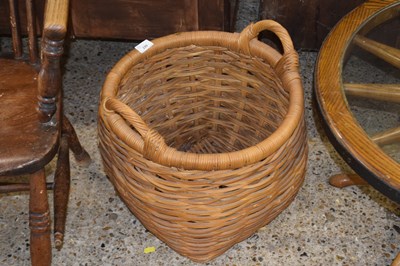 Lot 299 - A wicker log basket