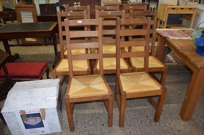 Lot 307 - A set of eight modern oak and rush seat...