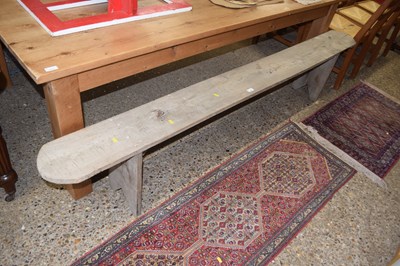 Lot 315 - A pine bench, 230cm long