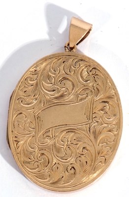 Lot 157 - 9ct gold large oval shaped hinged locket, the...