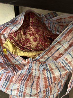 Lot 631 - A bag of red and gilt assorted curtains and...