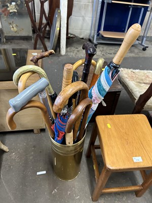 Lot 777 - Brass stick stand and contents