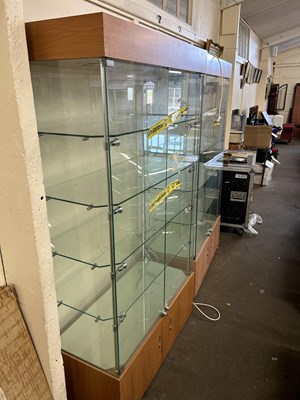 Lot 674 - Two glazed lockable display cabinets with lights