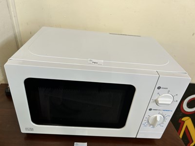 Lot 701 - A white compact microwave