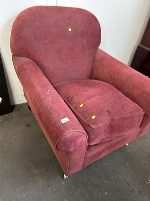 Lot 706 - A red upholstered armchair