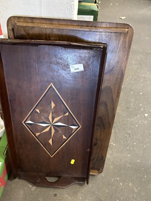 Lot 846 - A hardwood serving tray and a folding over the...