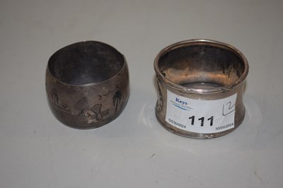 Lot 111 - Silver napkin ring and a further white metal...