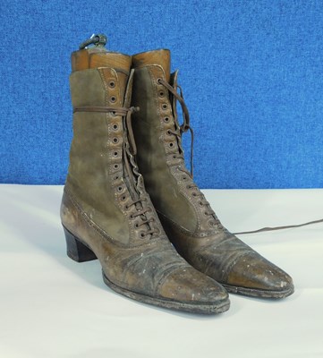 Lot 11 - A pair of lady's Victorian leather boots, the...