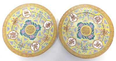 Lot 34 - Two yellow ground Chinese porcelain plates...
