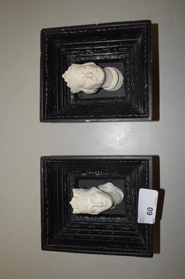 Lot 60 - A pair of plaster work royalty heads set in...