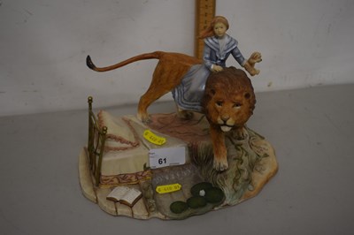 Lot 61 - Modern resin model of girl on lions back