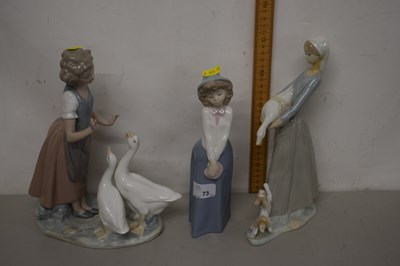 Lot 73 - A group of three Nao figures