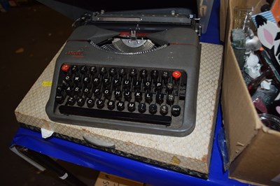 Lot 589 - Typewriter and a canteen of cutlery